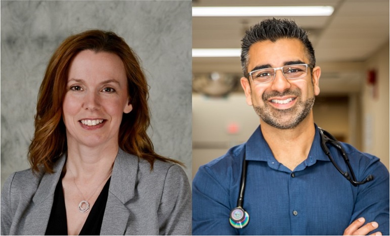 A Woman with red and brown long hair wearing a suit beside a man with short hair and glasses wearing a blue shirt and a stethoscope around his neck.